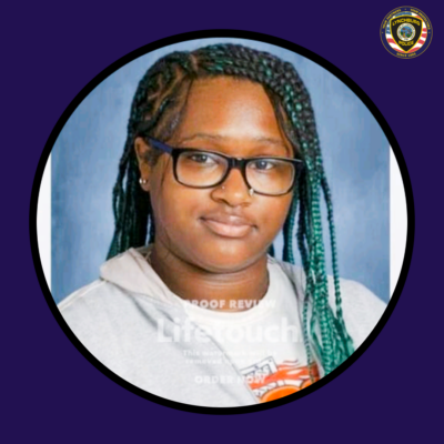 Photograph of missing 15-year-old Zamonii Morris. She is a Black female with long braids, glasses, and a nose piercing.